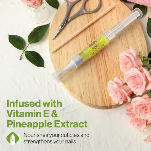 Cuticle oil with Vitamin E and pineapple extract on a wooden board with scissors and pink roses.