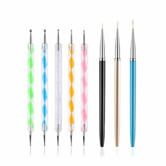 Set of nail art dotting tools and brushes in various colors.
